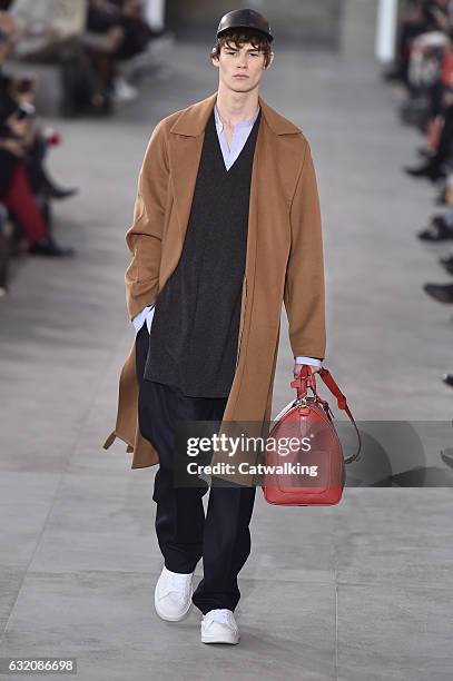 Model walks the runway at the Louis Vuitton Autumn Winter 2017 fashion show during Paris Menswear Fashion Week on January 19, 2017 in Paris, France.