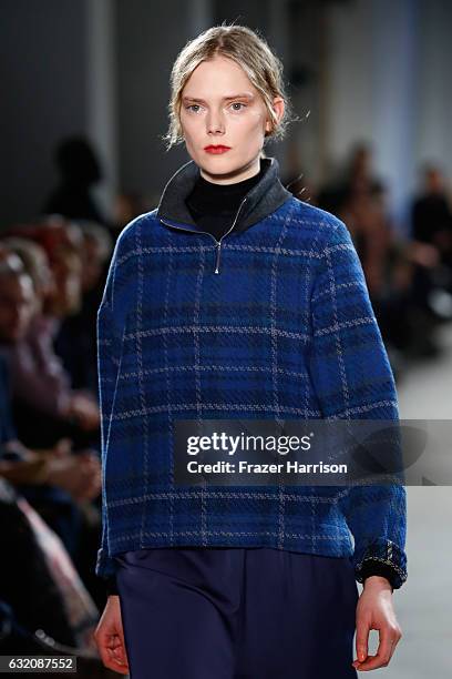 Model walks the runway at the Vladimir Karaleev show during the Mercedes-Benz Fashion Week Berlin A/W 2017 at Kaufhaus Jandorf on January 19, 2017 in...