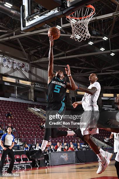 Alex Davis of the Greensboro Swarm drives to the basket during the game against the Erie Bayhawks as part of 2017 NBA D-League Showcase at the...
