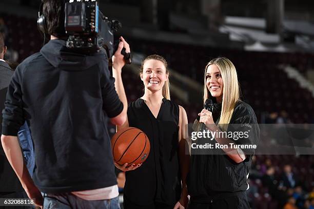 Raptors905 host Kalina with a fan and TV crew during the Greensboro Swarm v Erie Bayhawks game as part of 2017 NBA D-League Showcase at the Hershey...