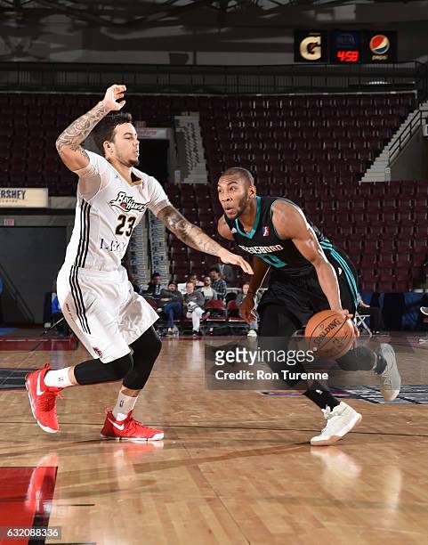 Rasheed Sulaimon of the Greensboro Swarm dribbles the ball by Gabe York of the Erie Bayhawks as part of 2017 NBA D-League Showcase at the Hershey...