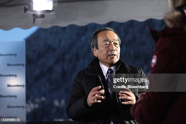 Takeshi Uchiyamada, chairman of Toyota Motor Corp., speaks during a Bloomberg Television interview at the World Economic Forum in Davos, Switzerland,...