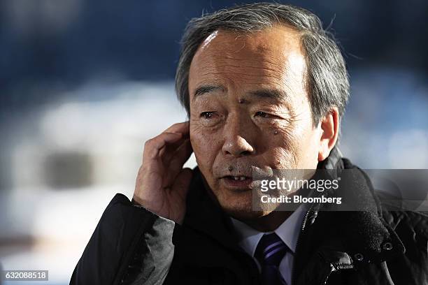Takeshi Uchiyamada, chairman of Toyota Motor Corp., speaks during a Bloomberg Television interview at the World Economic Forum in Davos, Switzerland,...