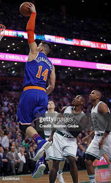 The Celtics' Terry Rozier and Al Horford can only watch as the Knicks' Willy Hernangomez slams home two fourth quarter points. The Boston Celtics...