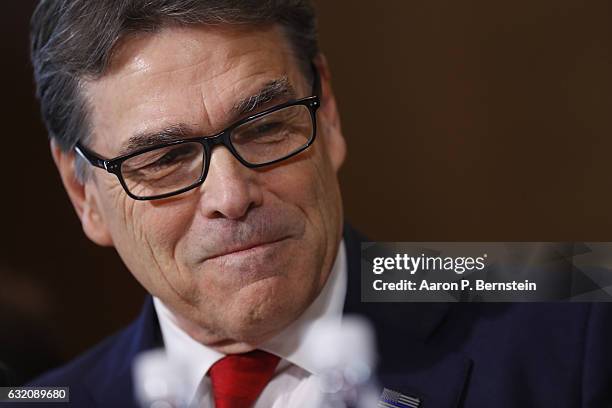 Former Texas Governor Rick Perry, President-elect Donald Trump's choice as Secretary of Energy, testifies during his confirmation hearing before the...