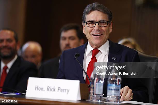 Former Texas Governor Rick Perry, President-elect Donald Trump's choice as Secretary of Energy, testifies during his confirmation hearing before the...