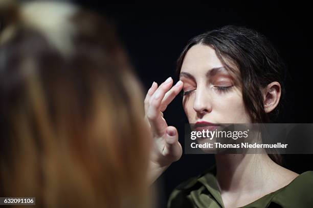 Model is seen backstage ahead of the Vladimir Karaleev show during the Mercedes-Benz Fashion Week Berlin A/W 2017 at Kaufhaus Jandorf on January 19,...