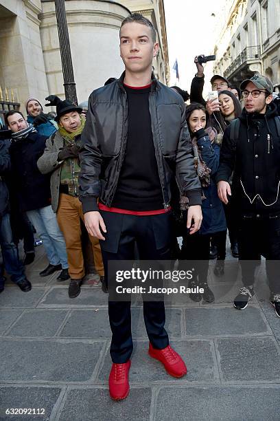 Travis seen arriving at the Louis Vuitton HQ in Paris with the