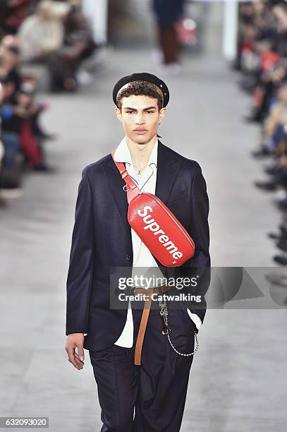 Model walks the runway at the Louis Vuitton Autumn Winter 2017 fashion show during Paris Menswear Fashion Week on January 19, 2017 in Paris, France.