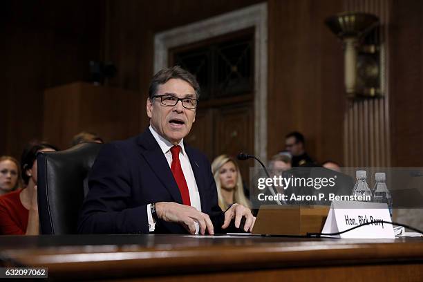 Former Texas Governor Rick Perry, President-elect Donald TrumpÕs choice as Secretary of Energy, testifies during his confirmation hearing before the...