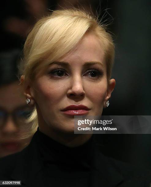 Louise Linton listens to her fiancee, Treasury Secretary nominee, Steven Mnuchin's Senate Finance committee confirmation hearing on Capitol Hill, on...