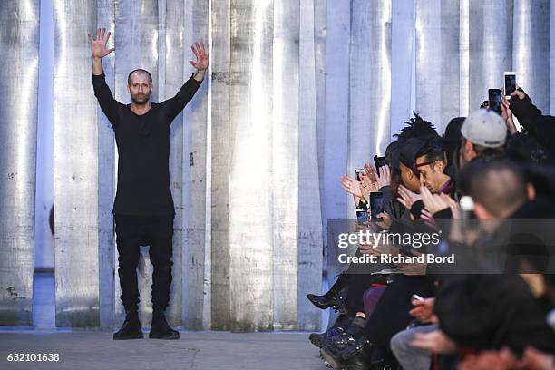 Designer Boris Bidjan Saberi walks the runway after the Boris Bidjan Saberi Menswear Fall/Winter 2017-2018 show at Garage Turenne as part of Paris...