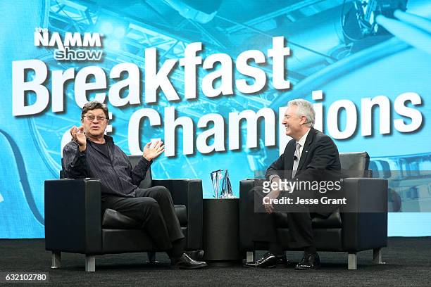 Musician Robbie Robertson speaks onstage with NAMM President and CEO Joe Lamond during the 2017 NAMM Show Opening Day at Anaheim Convention Center on...