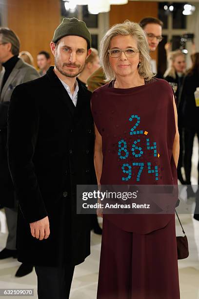 Clemens Schick and Inga Griese attend the 'Icons in Fashion' vernissage during the Der Berliner Mode Salon A/W 2017 at Kronprinzenpalais on January...