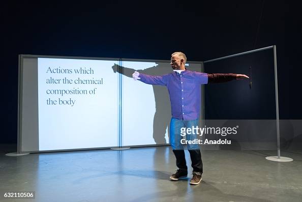 Dancer Charlie Morrisey takes part in the performance installation of ...