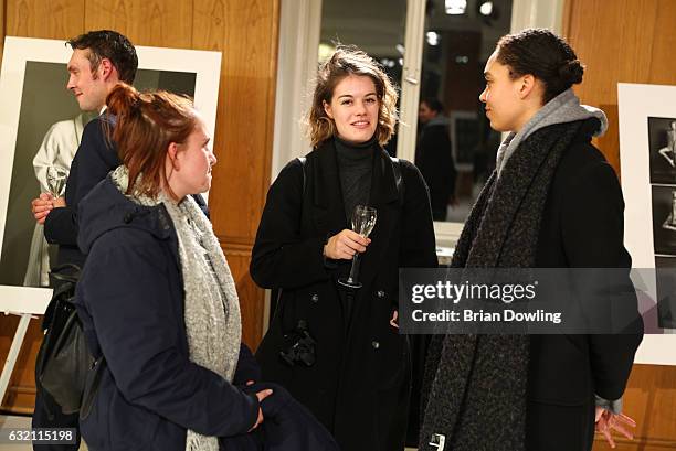 Guests at the 'Icons in Fashion' vernissage during the Der Berliner Mode Salon A/W 2017 at Kronprinzenpalais on January 19, 2017 in Berlin, Germany.