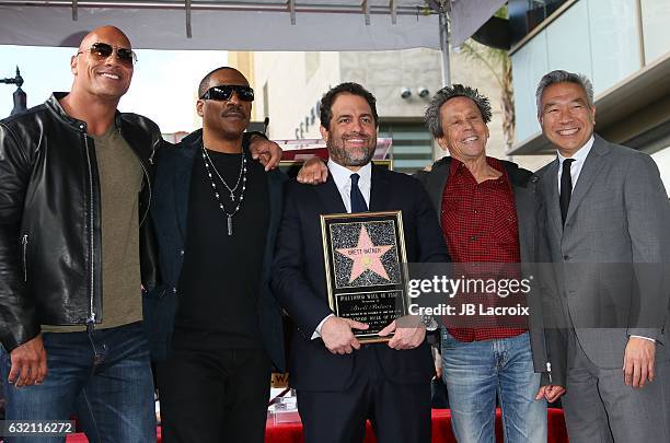 Dwayne Johnson, Eddie Murphy, Brett Ratner and Brian Glazer attend the ceremony honoring Brett Ratner with a star on the Hollywood Walk of Fame on...