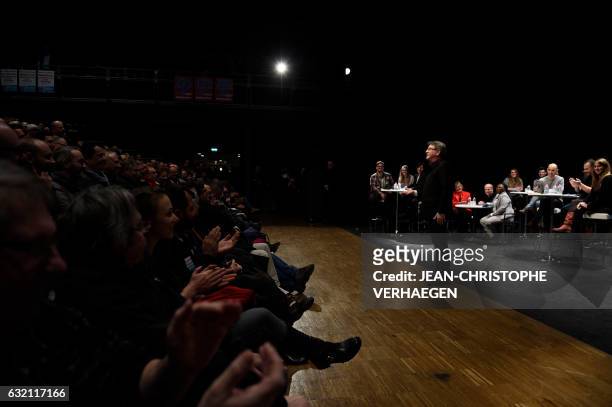 Jean-Luc Melenchon, candidate of the far left coalition "La France insoumise" for France's 2017 presidential elections, gestures as he speaks during...
