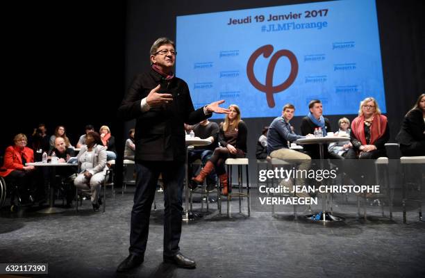 Jean-Luc Melenchon, candidate of the far left coalition "La France insoumise" for France's 2017 presidential elections, gestures as he speaks during...