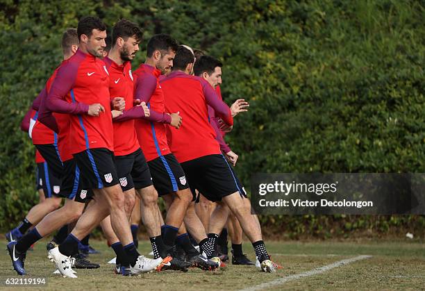 Chris Pontius, Brad Evans, Benny Feilhaber, Sacha Kljestan and their teammates jog during the USMNT training session at StubHub Center on January 19,...