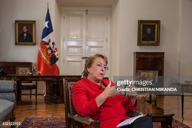 Chile's President Michelle Bachelet gives an interview to AFP in Santiago, on January 19, 2017. Bachelet said that she hopes Donald Trump will...