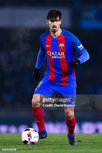 Andre Gomes of FC Barcelona runs with the ball during the Copa del Rey quarter-final first leg match between Real Sociedad and FC Barcelona at Anoeta...