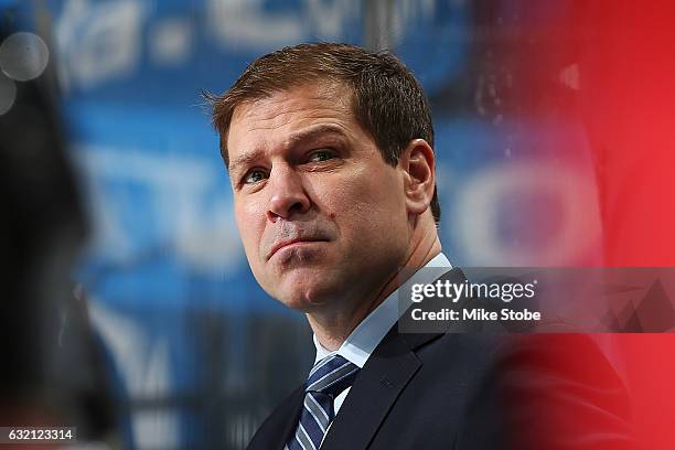 Doug Weight of the New York Islanders looks on from the bench during his first game as head coach against the Dallas Stars at the Barclays Center on...