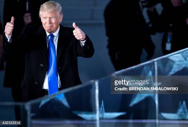 President-elect Donald Trump gestures during a welcome celebration at the Lincoln Memorial in Washington, DC, on January 19, 2017.
