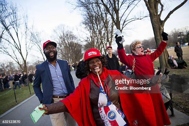 People react during the "Make America Great Again" Welcome Celebration concert at the Lincoln Memorial in Washington, D.C., on Thursday, Jan. 19,...