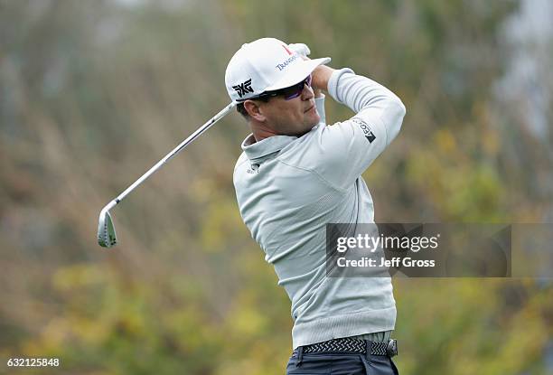 Zach Johnson plays his shot from the third tee during the first round of the CareerBuilder Challenge in Partnership with The Clinton Foundation at La...