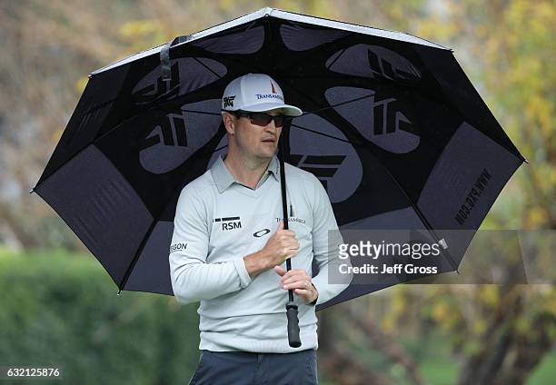 Zach Johnson waits to tee off on the third hole during the first round of the CareerBuilder Challenge in Partnership with The Clinton Foundation at...