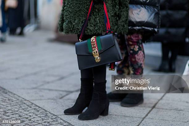 Gucci bag outside Vladimir Karaleev during the Mercedes-Benz Fashion Week Berlin A/W 2017 at Kaufhaus Jandorf on January 19, 2017 in Berlin, Germany.