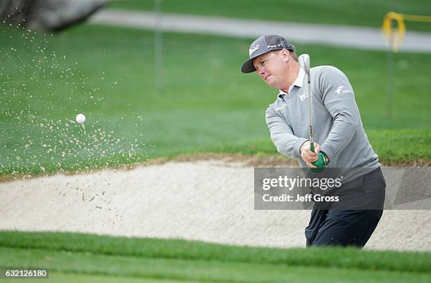 Charley Hoffman plays his shot out of the bunker on the sixth hole during the first round of the CareerBuilder Challenge in Partnership with The...