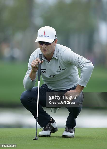 Zach Johnson lines up a putt on the third hole during the first round of the CareerBuilder Challenge in Partnership with The Clinton Foundation at La...