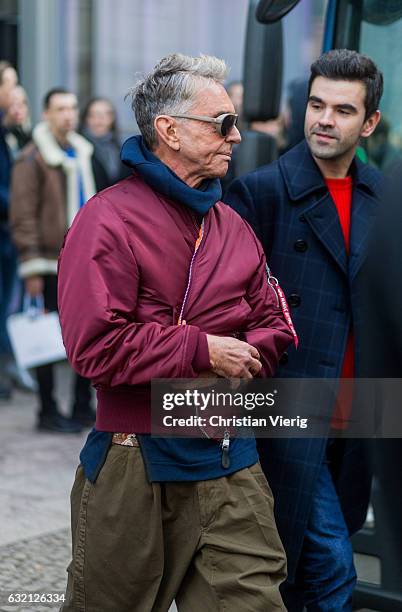 German designer Wolfgang Joop wearing a red bomber jacket and hoody at Marina Hoermanseder during the Mercedes-Benz Fashion Week Berlin A/W 2017 at...