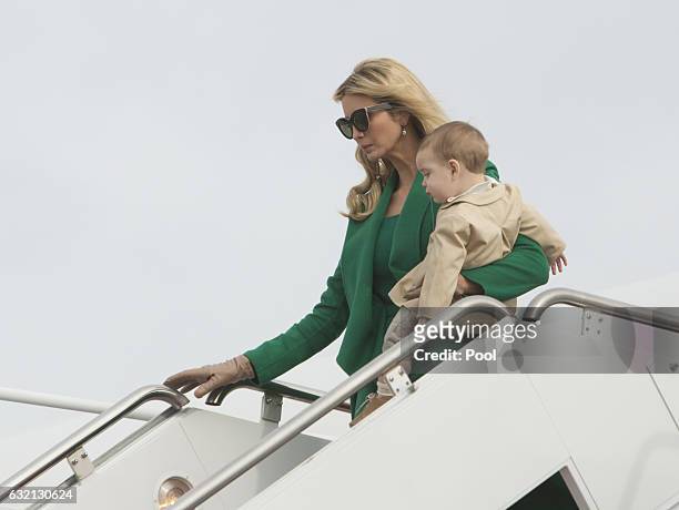 Ivanka Trump, carrying son Theordore James Kushner, arrives at Joint Base Andrews in January 19, 2017 in Maryland. Hundreds of thousands of people...