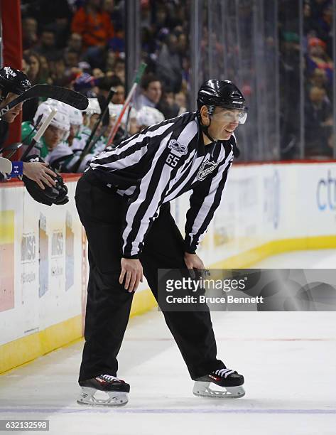 Linesman Pierre Racicot works the game between the New York Islanders and the Dallas Stars at the Barclays Center on January 19, 2017 in the Brooklyn...
