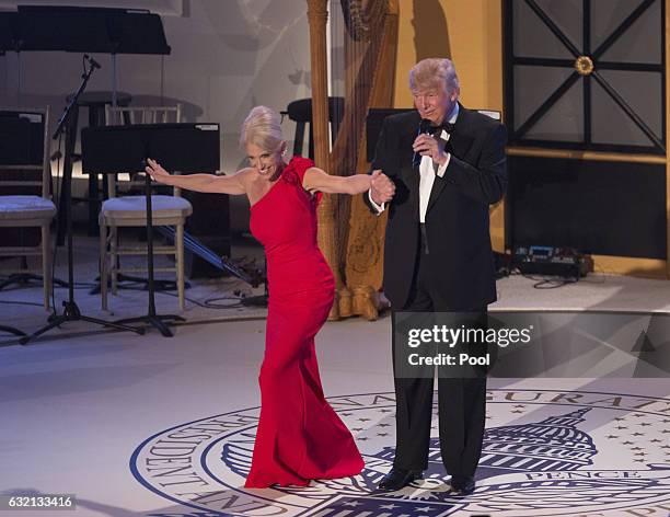 President-elect Donald J. Trump and campaign manager Kellyanne Conway take a bow at the Indiana Society Ball to thank donors January 19, 2017 in...