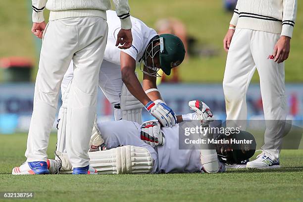 Rubel Hossain of Bangladesh reacst after being hit on the arm during day one of the Second Test match between New Zealand and Bangladesh at Hagley...