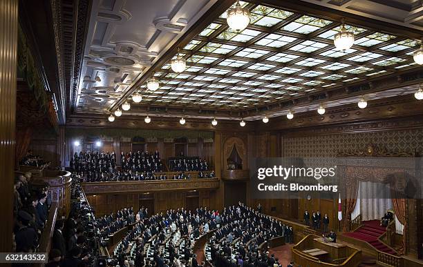Japanese Emperor Akihito, right, attends the opening of the plenary session at the upper house of the parliament in Tokyo, Japan, on Friday, Jan. 20,...