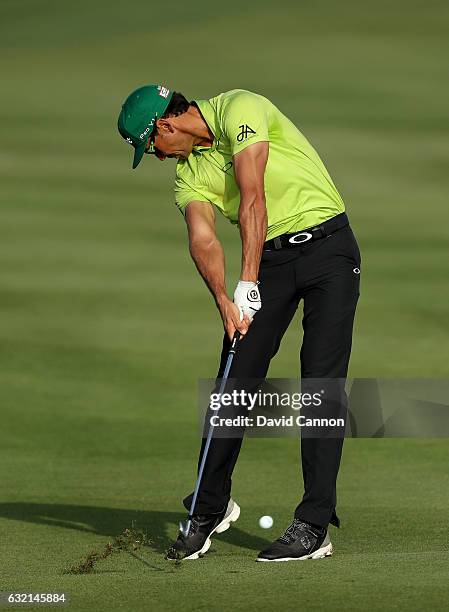 Rafa Cabrera Bello of Spain plays his second shot on the 14th hole during the second round of the 2017 Abu Dhabi HSBC Golf Championship at Abu Dhabi...