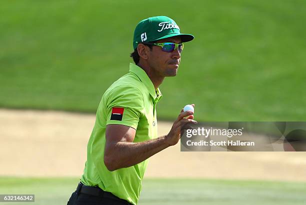 Rafa Cabrera-Bello of Spain acknowledges his birdie on the 8th green during the second round of the Abu Dhabi HSBC Championship at the Abu Dhabi Golf...
