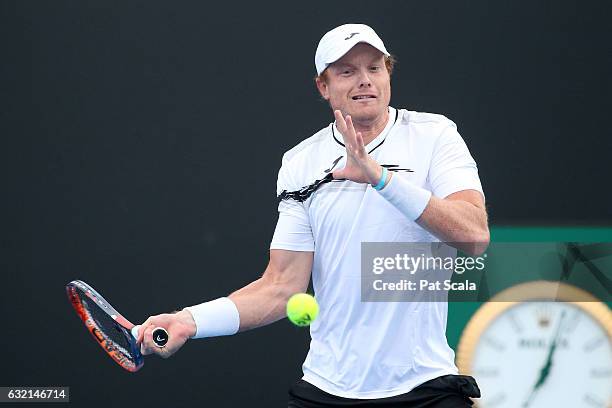 Matthew Barton of Australia plays a shot in his second round doubles match with Matthew Ebden of Australia against Pablo Carreno Busta and Guillermo...