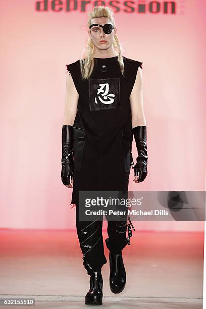 Model walks the runway at the DEPRESSION show during the Mercedes-Benz Fashion Week Berlin A/W 2017 at Kaufhaus Jandorf on January 20, 2017 in...