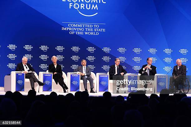 From left to right, Martin Wolf, chief economics commentator of The Financial Times, Christine Lagarde, managing director of the International...