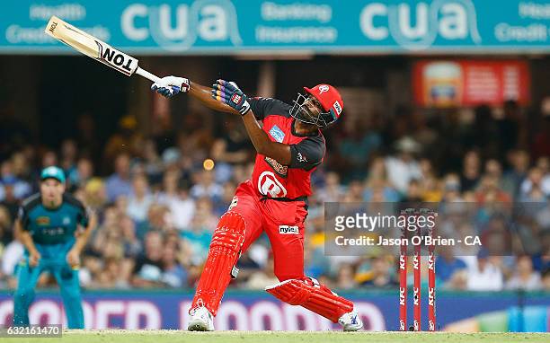 Thisara Perera of the Renegades hits a shot during the Big Bash League match between the Brisbane Heat and the Melbourne Renegades at The Gabba on...