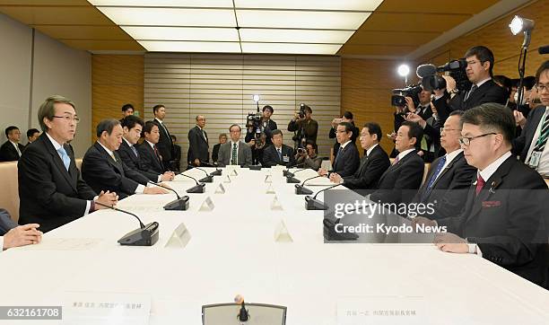 Nobuteru Ishihara , Japan's minister in charge of the Trans-Pacific Partnership trade pact, attends a ministerial meeting in Tokyo on Jan. 20 prior...