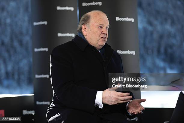 Michael Noonan, Ireland's finance minister, gestures as he speaks during a Bloomberg Television interview during the World Economic Forum in Davos,...