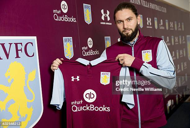 New signing Henri Lansbury of Aston Villa poses for a picture at the club's training ground at Bodymoor Heath on January 19, 2017 in Birmingham,...