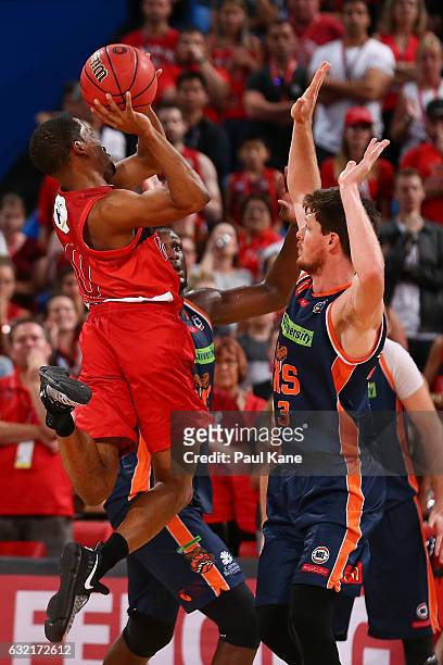 Bryce Cotton of the Wildcats puts a shot up in the dying seconds of the game to fouled during the round 16 NBL match between the Perth Wildcats and...